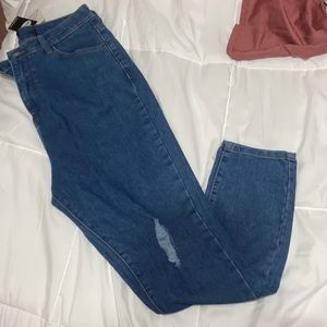 Ripped knee skinny jeans